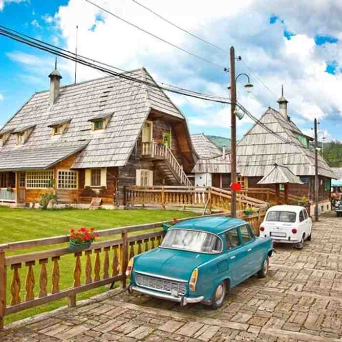 Scenic Mountains and Wooden Towns